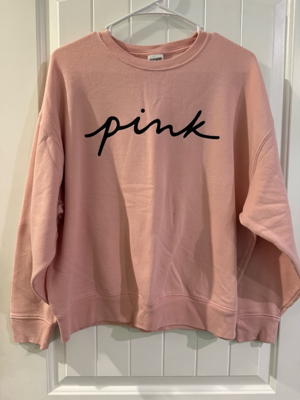 Pink women’s sweat shirt